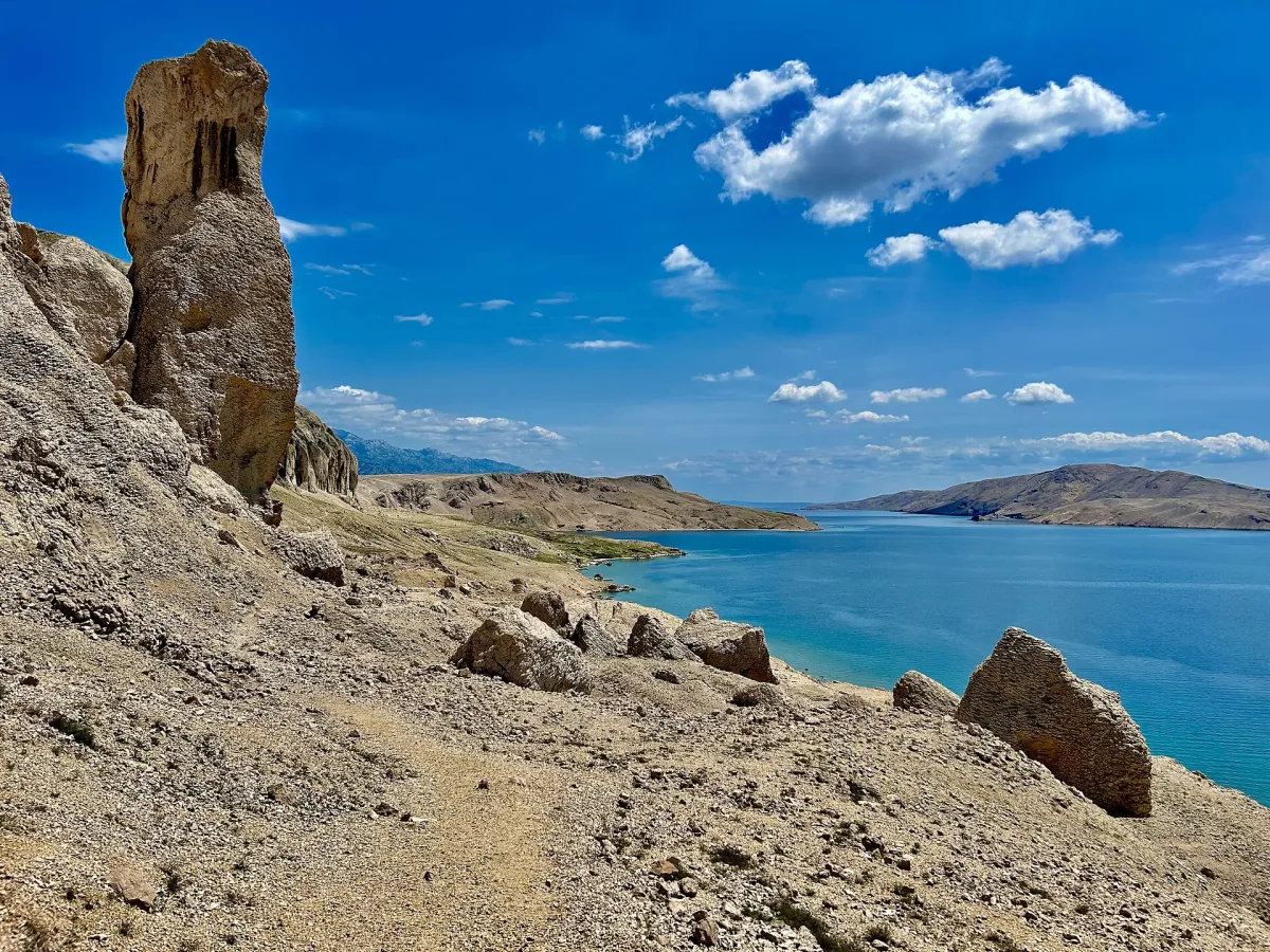 The Stogaj rock tower above the sea on the Life on Mars trail, Pag island